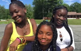 a group of women smiling