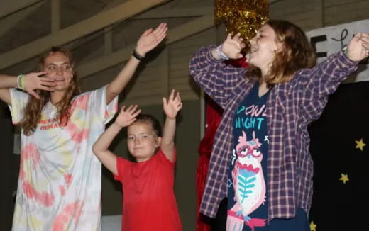 a group of people posing for a photo