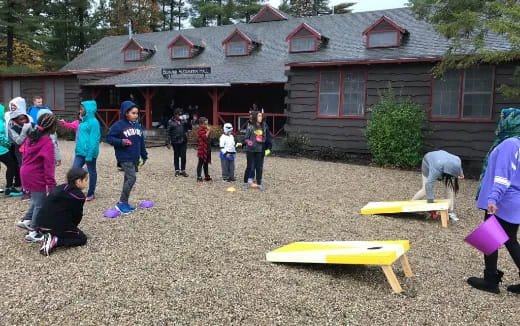 a group of people outside a building
