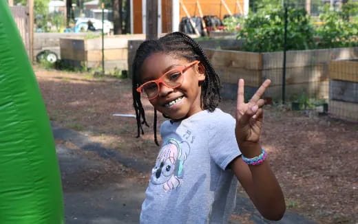 a girl wearing glasses