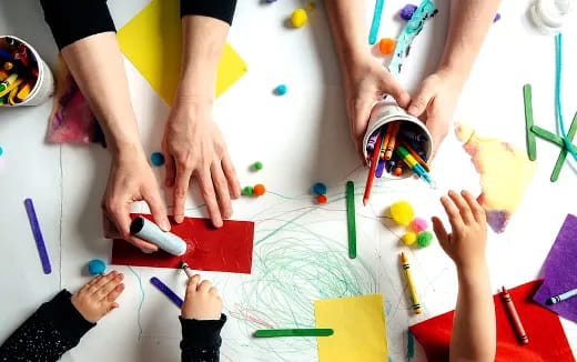 a group of people painting