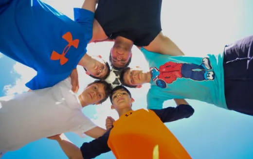 a group of people in a circle