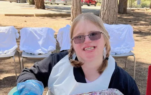 a woman sitting in a chair