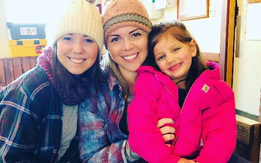 a group of girls smiling