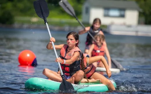a group of people in a raft