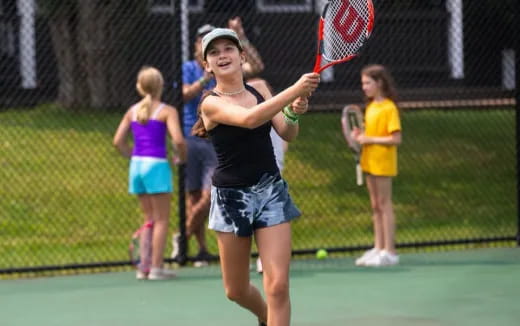 a woman playing tennis