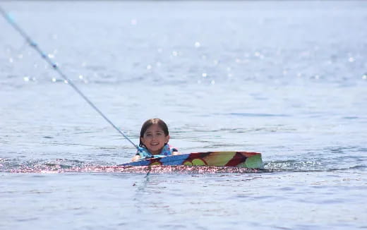 a child on a surfboard