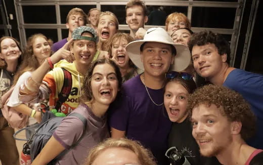 a group of people posing for a photo