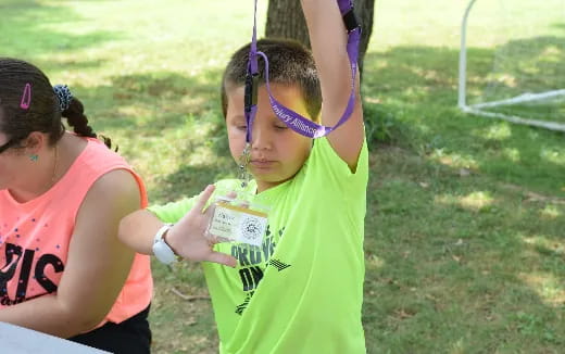 a person holding a cupcake