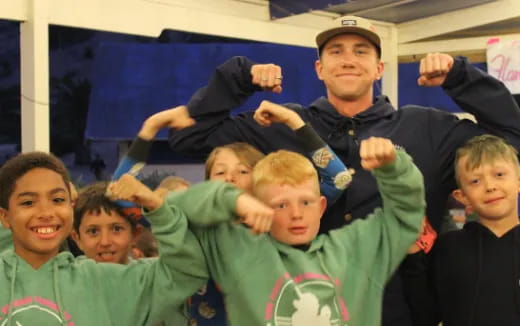 a group of boys posing for a photo
