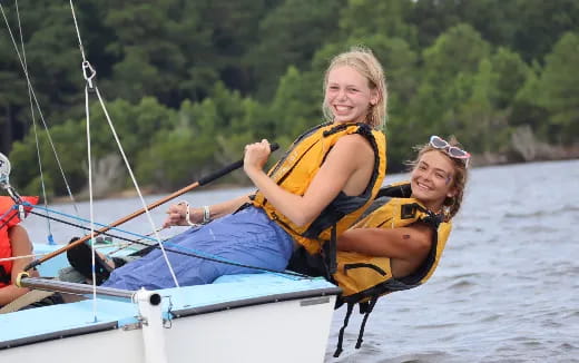 a couple of people on a boat