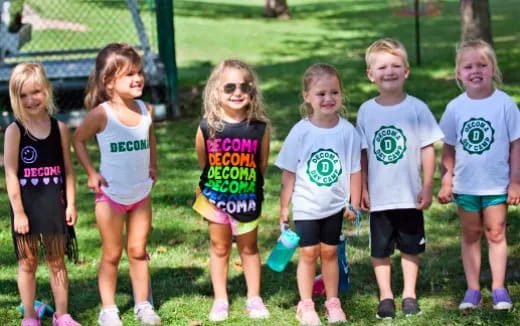 a group of children posing for a photo