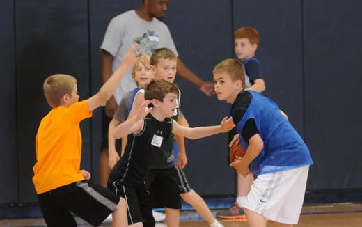 a group of boys in a gym