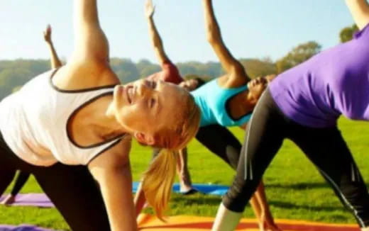 a group of people doing a hula hoop