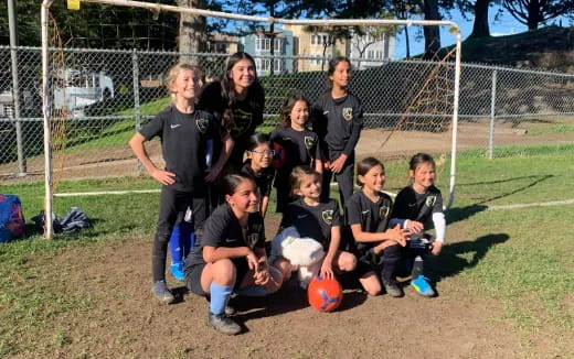 a group of people posing for a photo