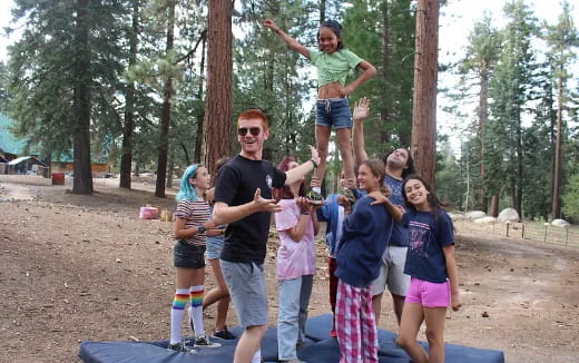 a group of people posing for a photo