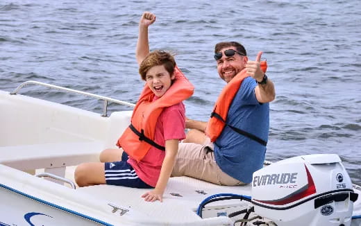 a man and a woman on a boat