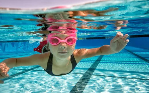 a woman in a pool