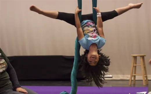 a person doing a handstand