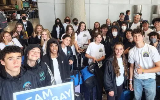 a group of people posing for a photo