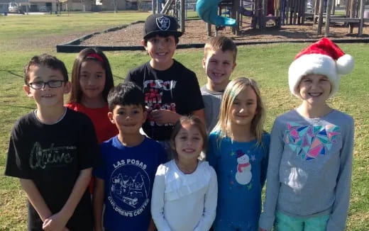a group of children posing for a photo