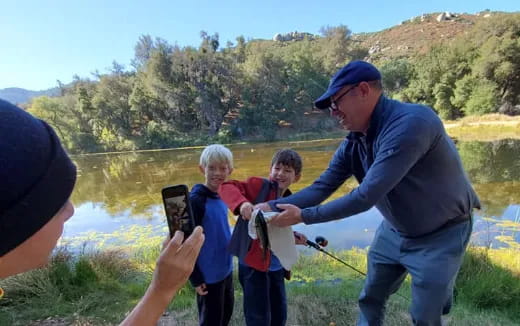 a group of people fishing