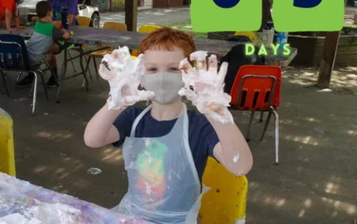 a boy holding a stuffed animal