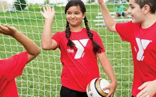 a person holding a ball