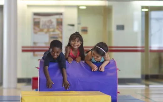 a group of children on a mat
