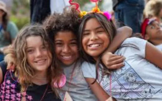 a group of people posing for the camera