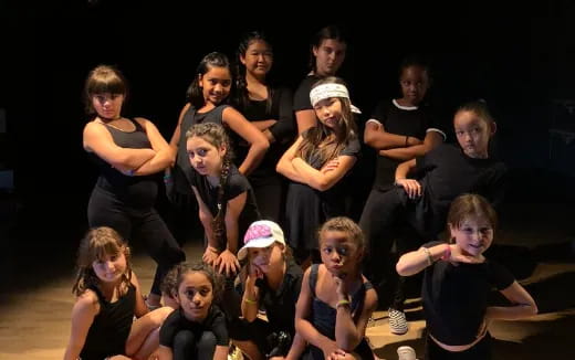 a group of people posing for a photo