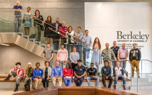 a group of people posing for a photo