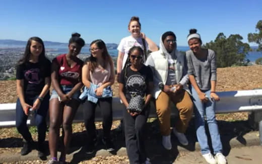 a group of people posing for a photo