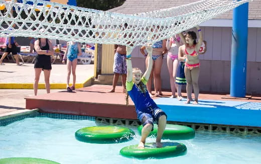 a person playing in a water park