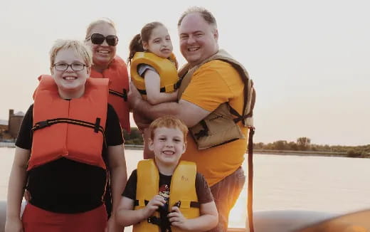 a group of people wearing life jackets