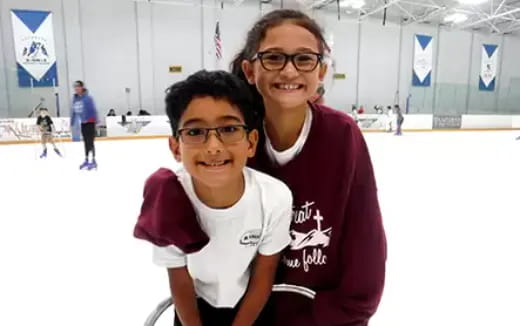 a couple of girls posing for the camera