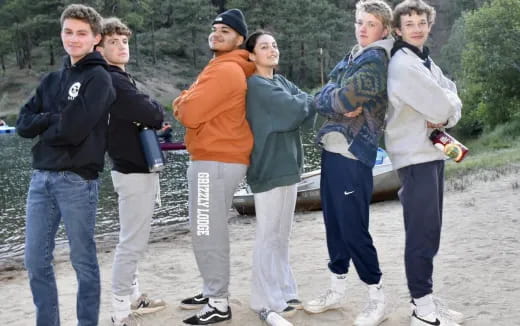 a group of people standing together outside