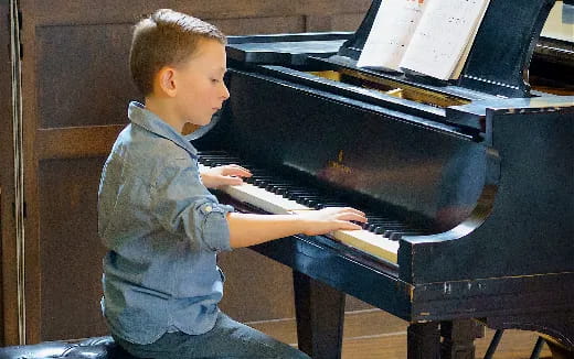 a child playing a piano