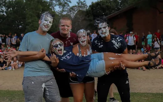 a group of people wearing masks