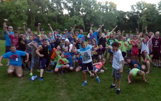 a group of people posing for a photo