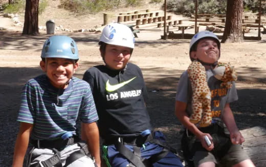 a group of boys wearing helmets