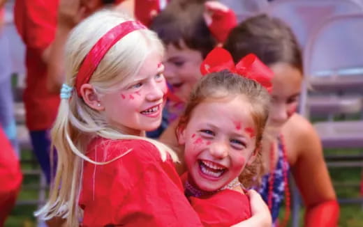 a group of children smiling