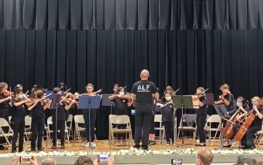 a group of people playing instruments