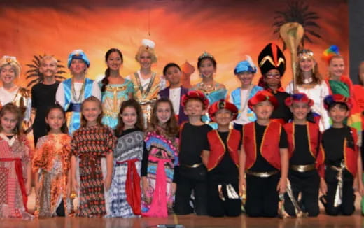 a group of people posing for a photo