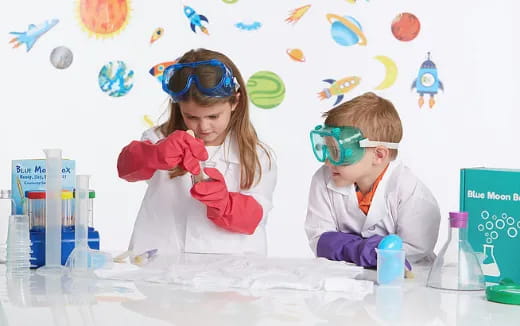 a couple of kids wearing goggles