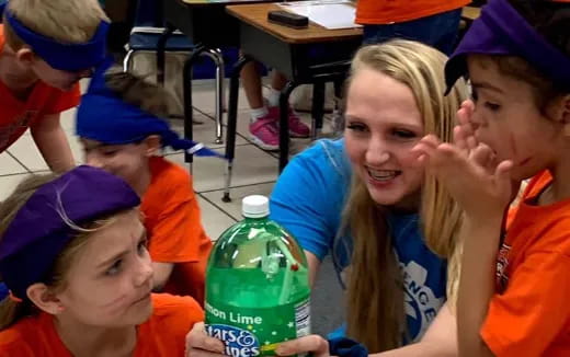 a group of children in a classroom