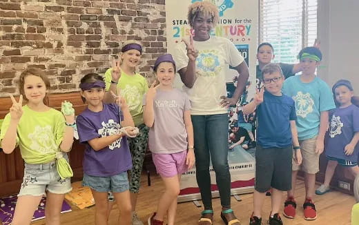 a group of children posing for a photo