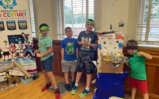 a group of kids posing for a picture