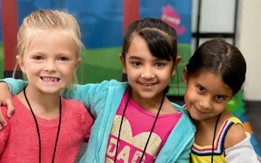 a group of children smiling