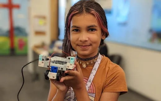 a person holding a toy